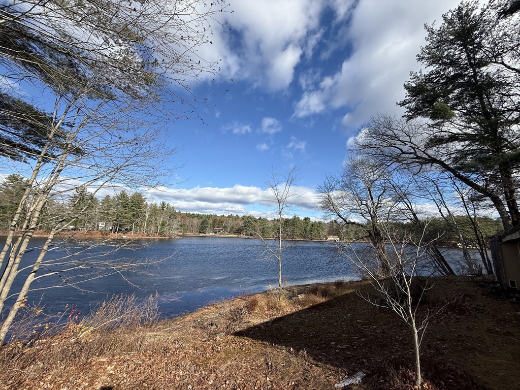 a view of a backyard of the house