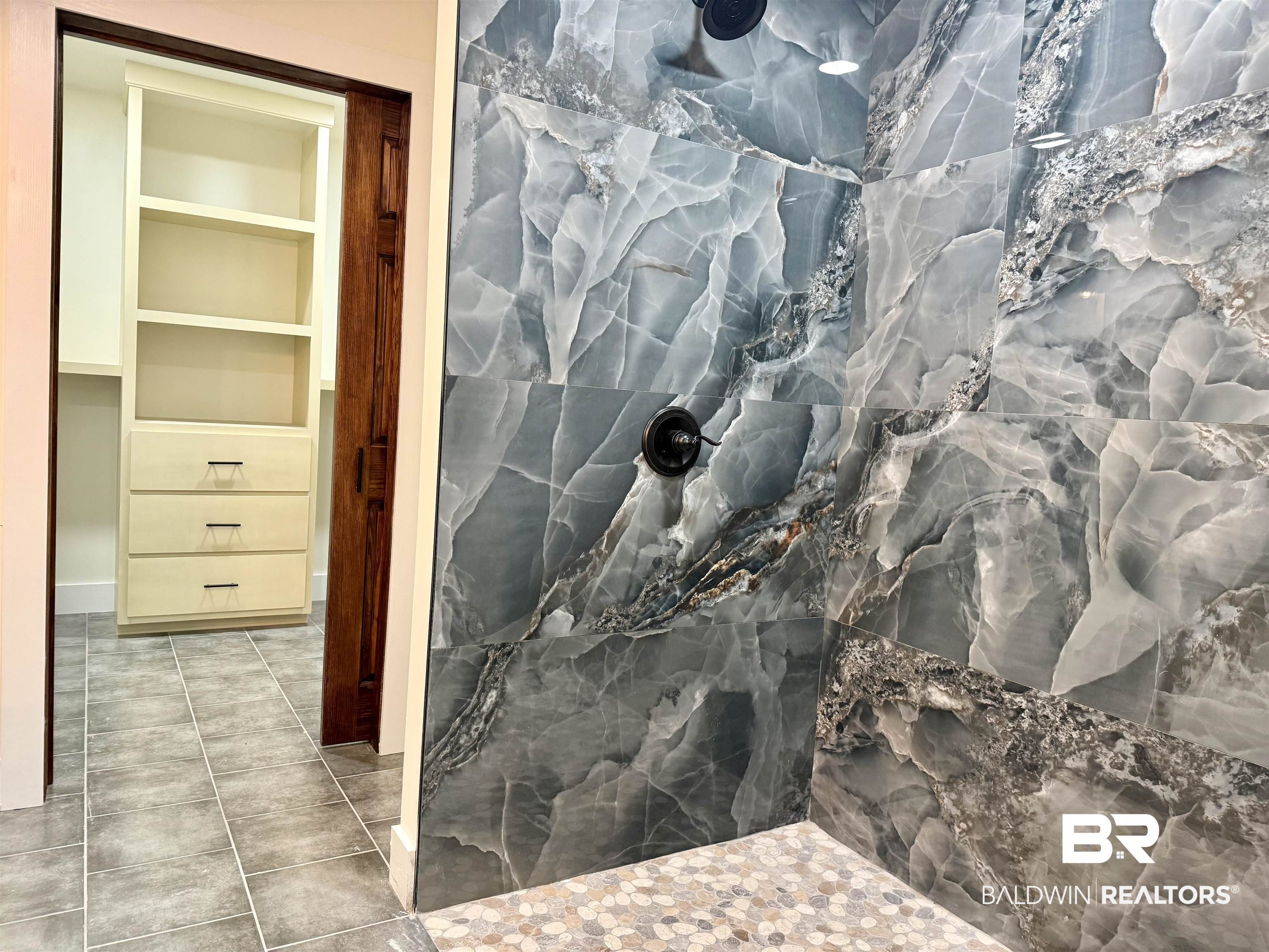 613 Forrest Avenue Brewton, AL 36426 - Photo 14 of 22 Bathroom view of a marble finish shower
