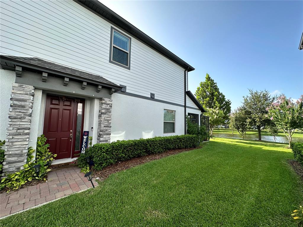 250 Rustic Loop Sanford, FL 32771 - Photo 30 of 33 a front view of house with yard and green space