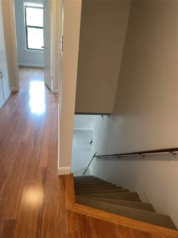 a living room with wooden floor