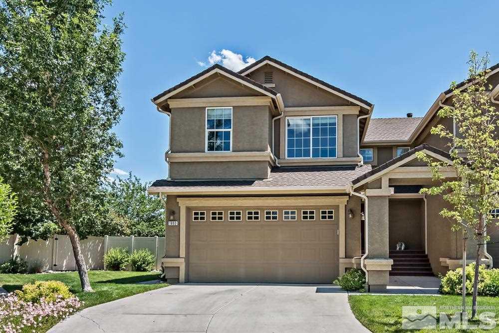 1893 Resistol Drive Reno, NV 89521 - Photo 2 of 26 a front view of a house with a garden
