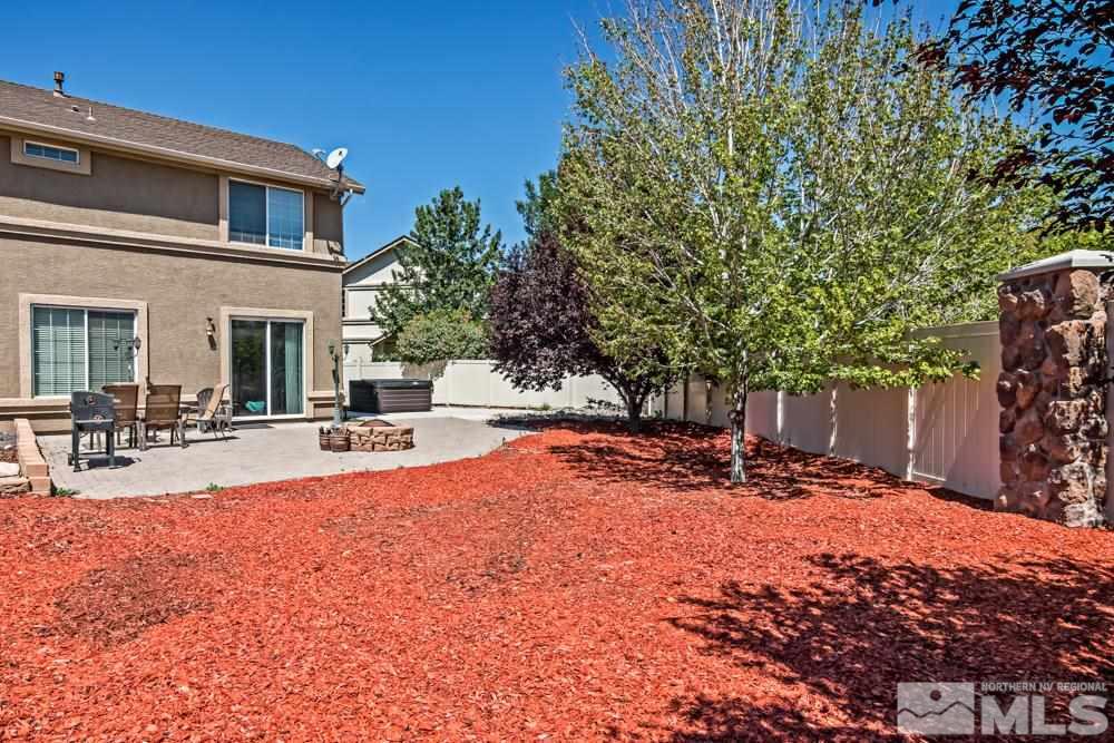 1893 Resistol Drive Reno, NV 89521 - Photo 23 of 26 a view of a house with swimming pool and sitting area