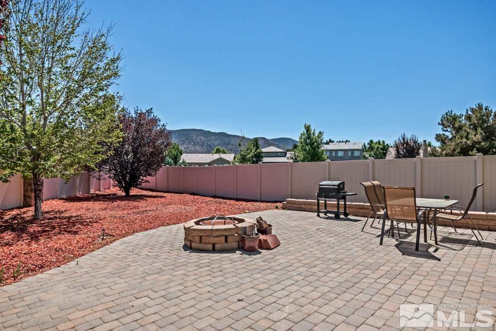 1893 Resistol Drive Reno, NV 89521 - Photo 26 of 26 a view of a patio with table and chairs and couches