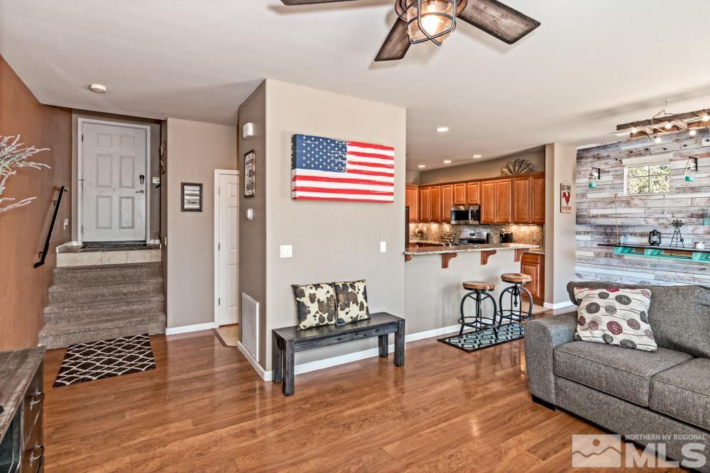 1893 Resistol Drive Reno, NV 89521 - Photo 4 of 26 a living room with furniture and kitchen view