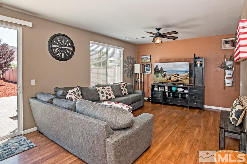 1893 Resistol Drive Reno, NV 89521 - Photo 6 of 26 a living room with furniture and a large window