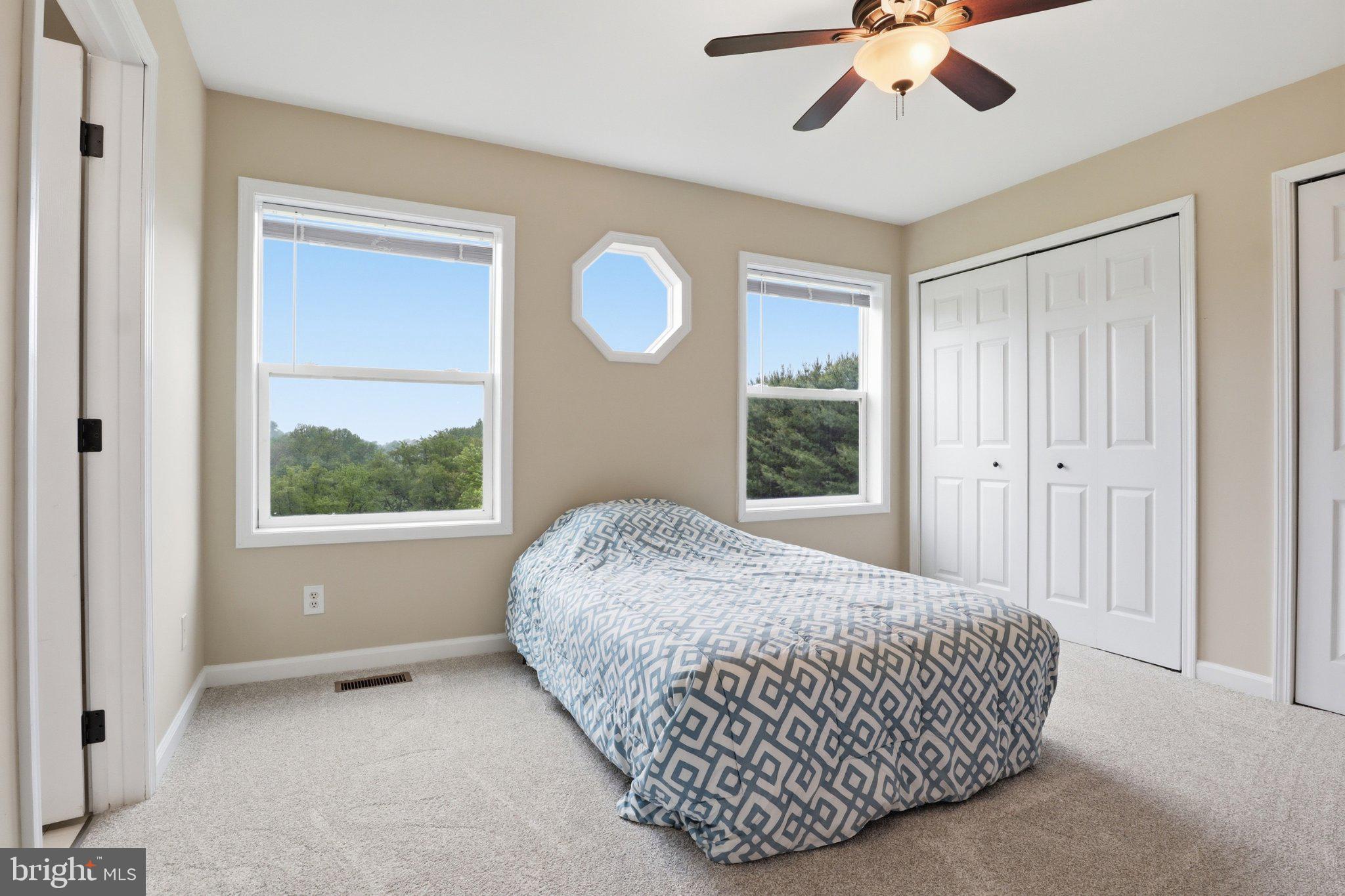 491 Garvine Mill Road Fawn Grove, PA 17321 - Photo 19 of 47 a living room with a bed furniture and a window