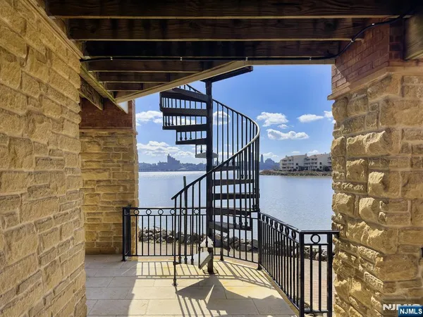 a view of a balcony with outdoor space