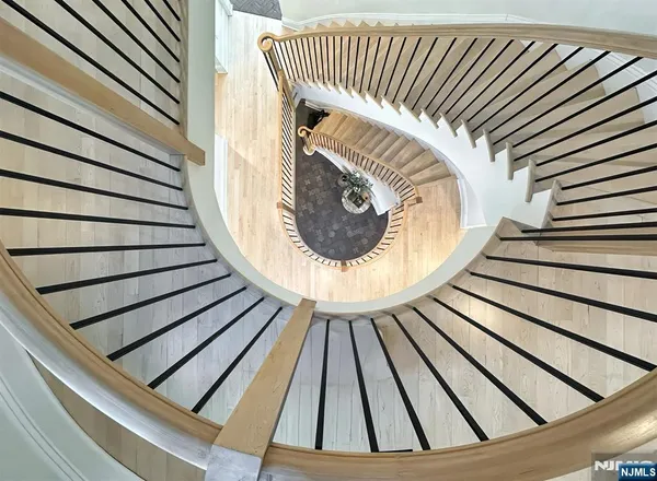 a view of a roof deck with furniture