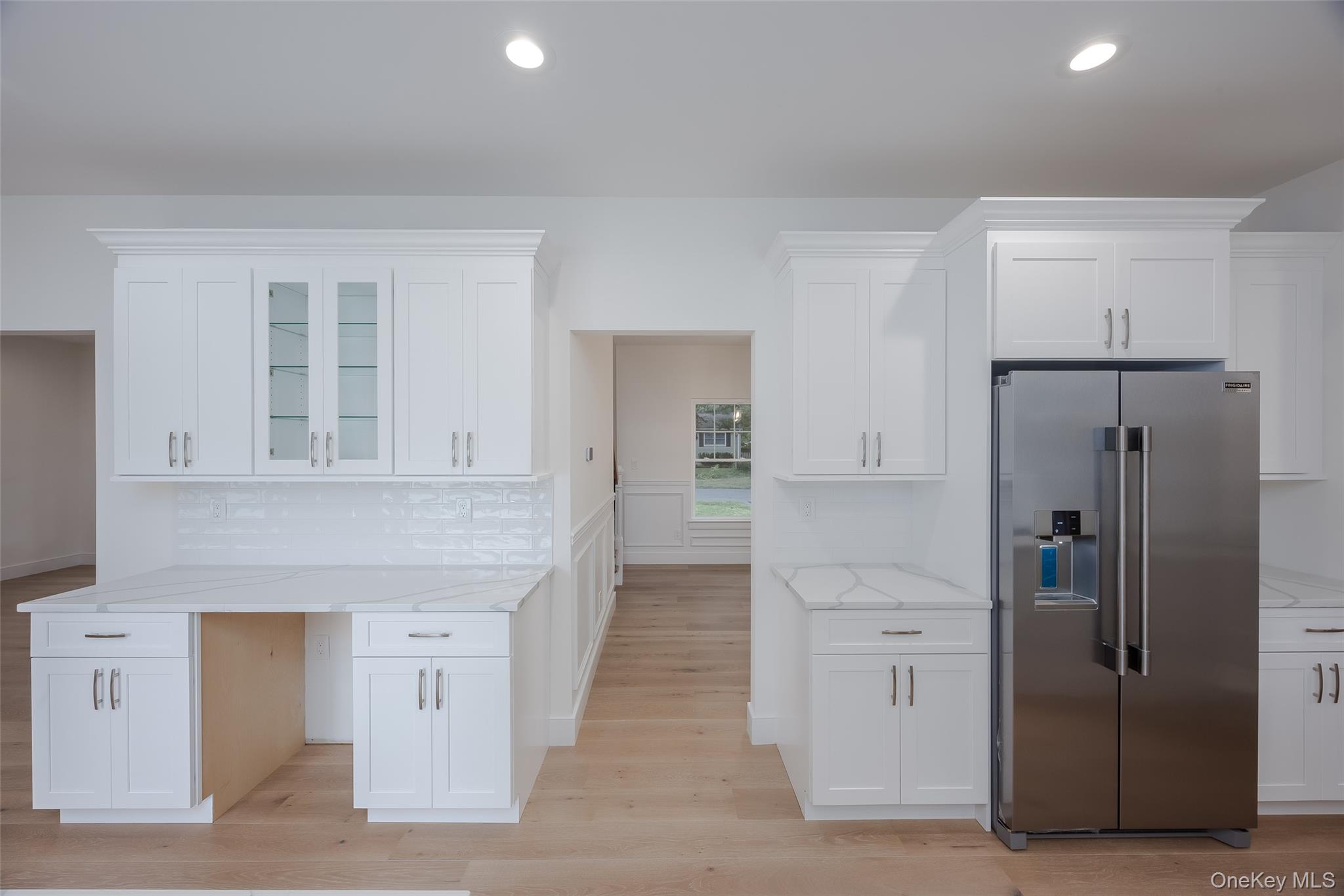 40 Zenith Road Rocky Point, NY 11778 - Photo 11 of 38 wooden floor with white cabinets