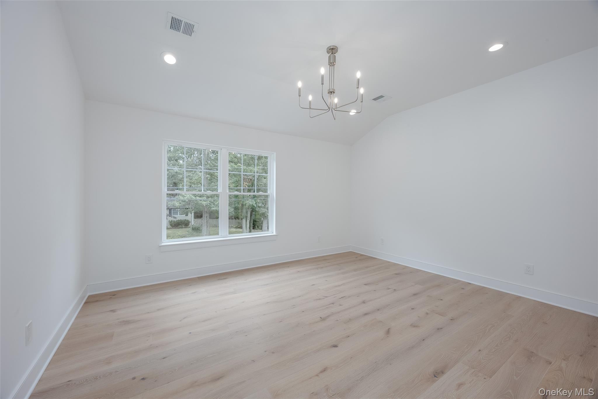 40 Zenith Road Rocky Point, NY 11778 - Photo 26 of 38 a view of an empty room with a window