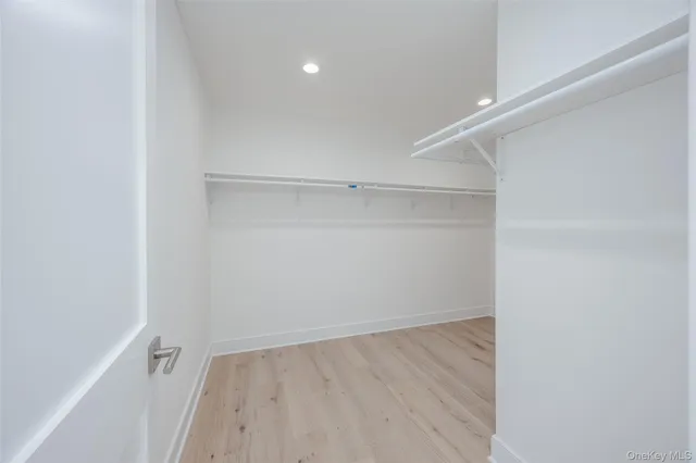 a view of an empty walk in closet
