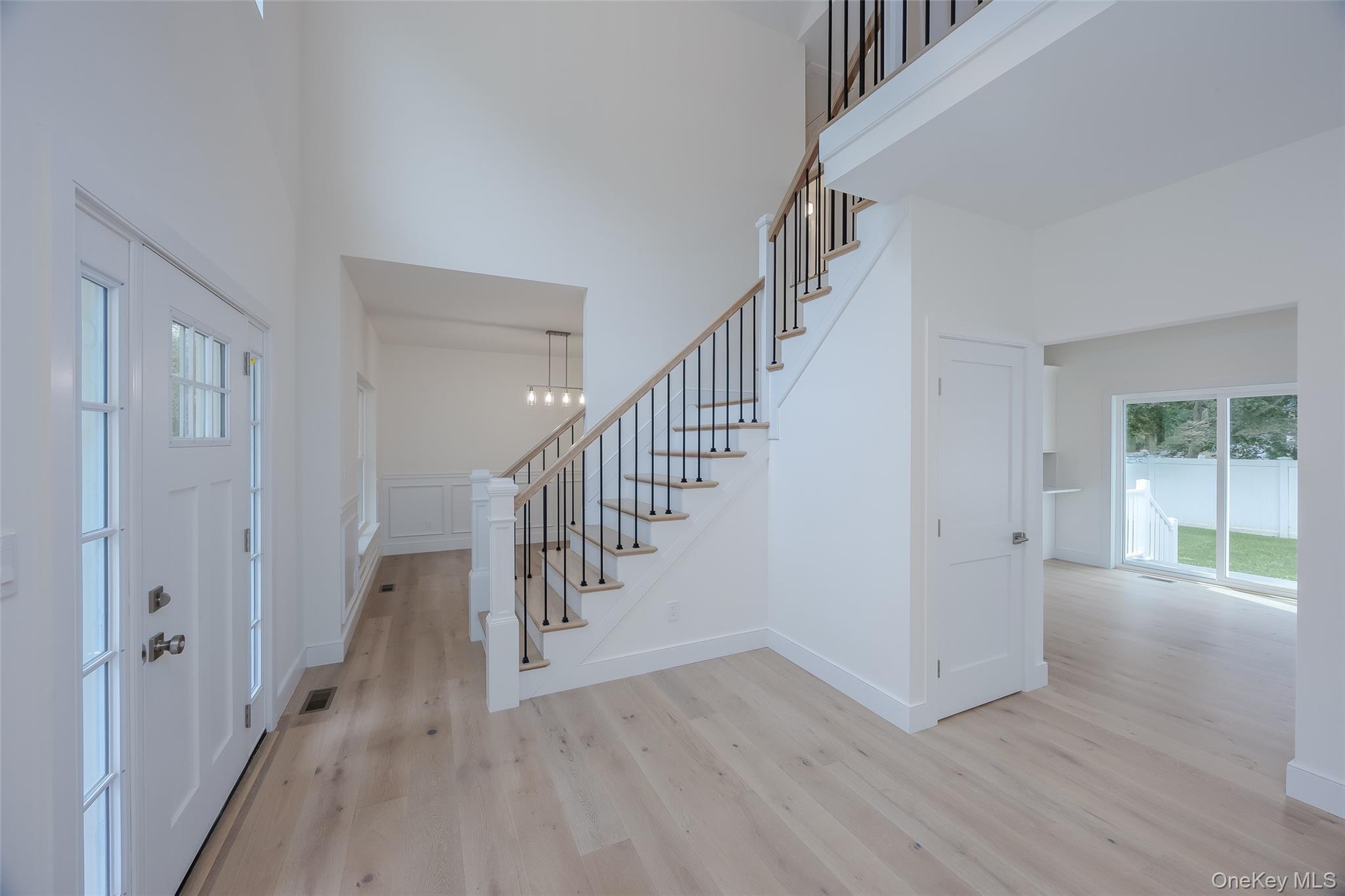 40 Zenith Road Rocky Point, NY 11778 - Photo 6 of 38 a view of entryway and hall with wooden floor