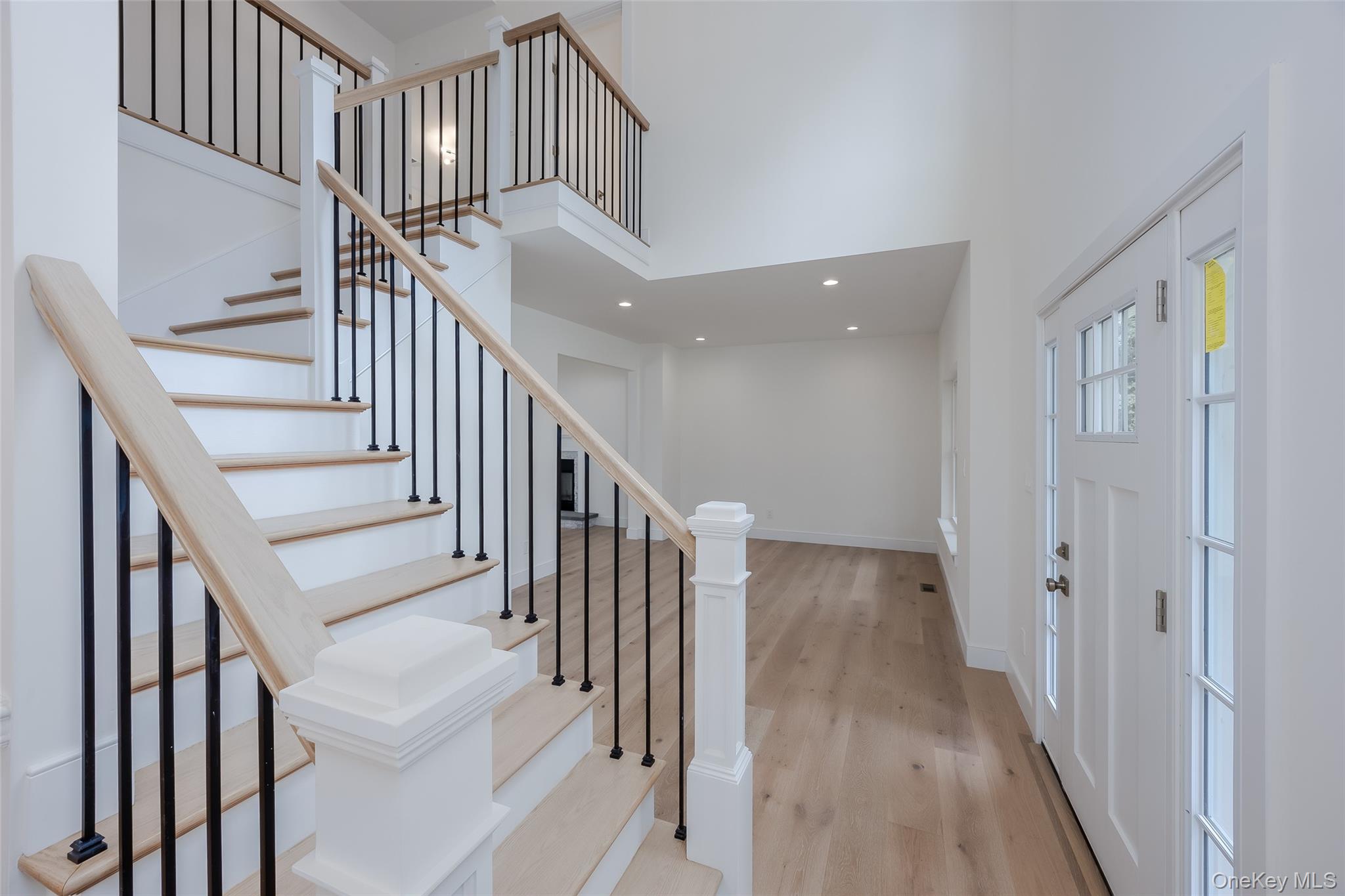 40 Zenith Road Rocky Point, NY 11778 - Photo 7 of 38 a view of staircase with wooden floor and white walls