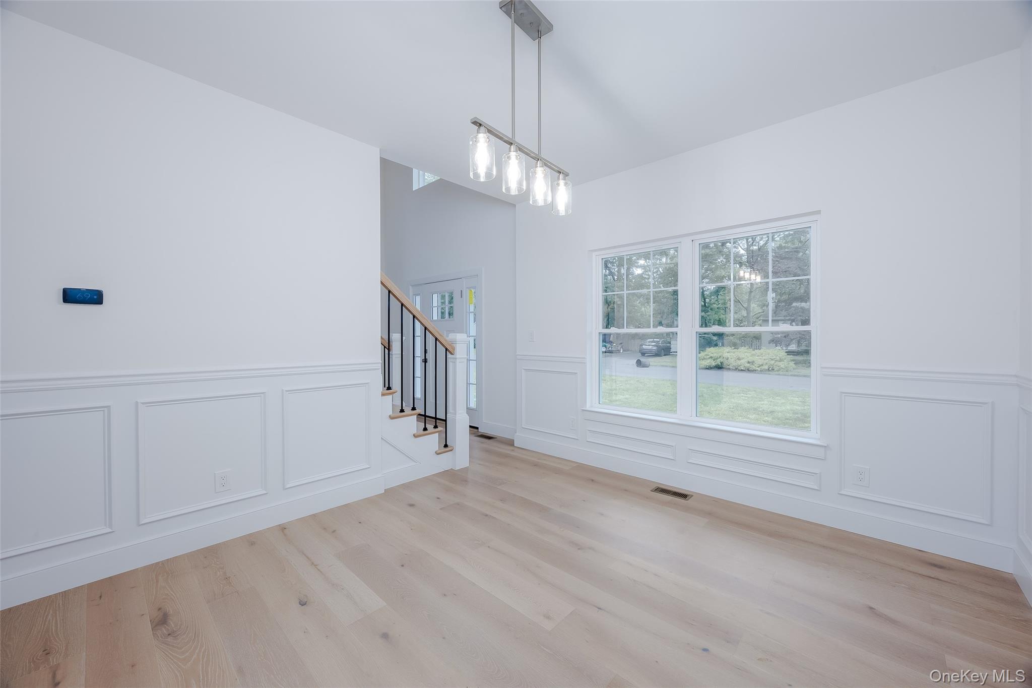 40 Zenith Road Rocky Point, NY 11778 - Photo 9 of 38 a view of an empty room with a window