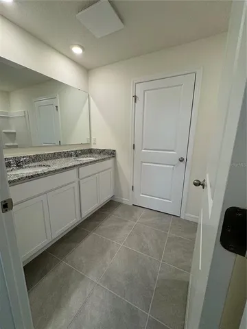 a view of room with window and closet