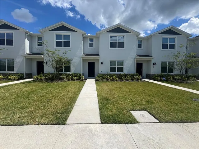 a view of a house with a swimming pool