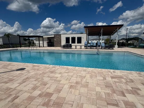 a view of a house with swimming pool