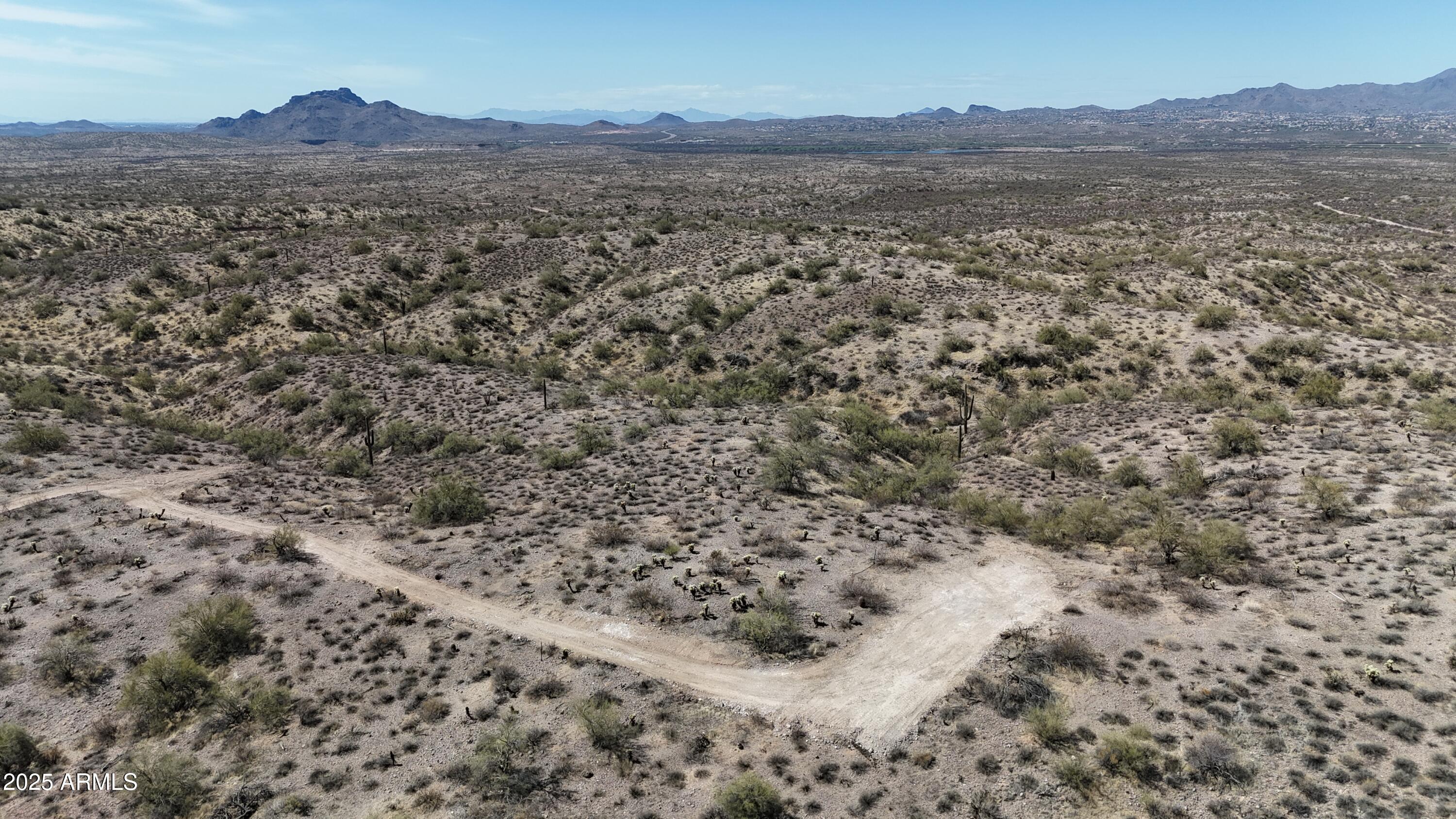 Lot 19 East K E Sandy Bluff Road, Unit 19K Fort McDowell, AZ 85264 - Photo 11 of 26 a view of a field with a mountain in the background