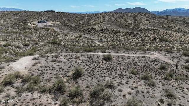 a view of a back yard with a swimming pool