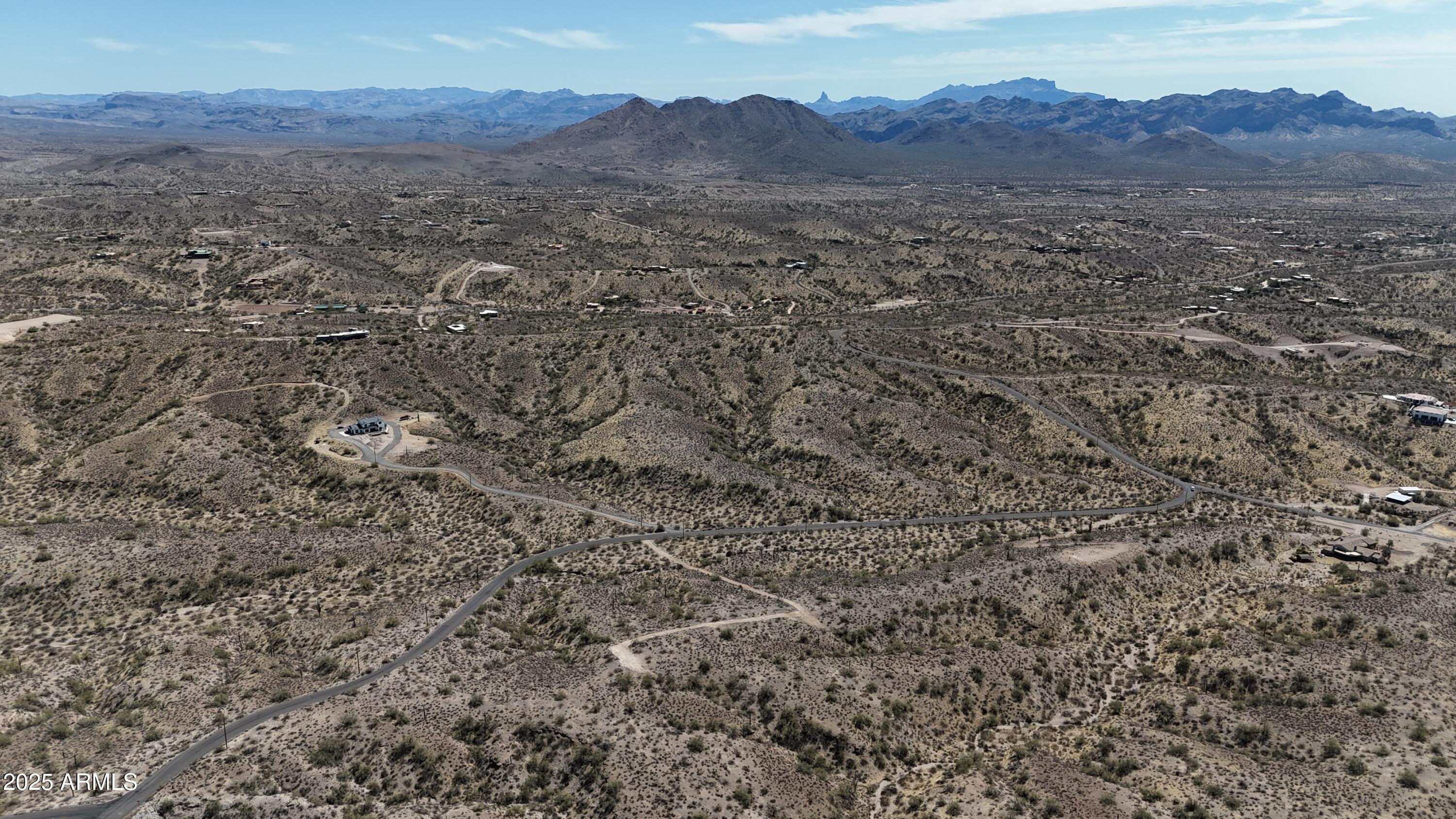 Lot 19 East K E Sandy Bluff Road, Unit 19K Fort McDowell, AZ 85264 - Photo 23 of 26 a view of a dry yard with mountains in the background