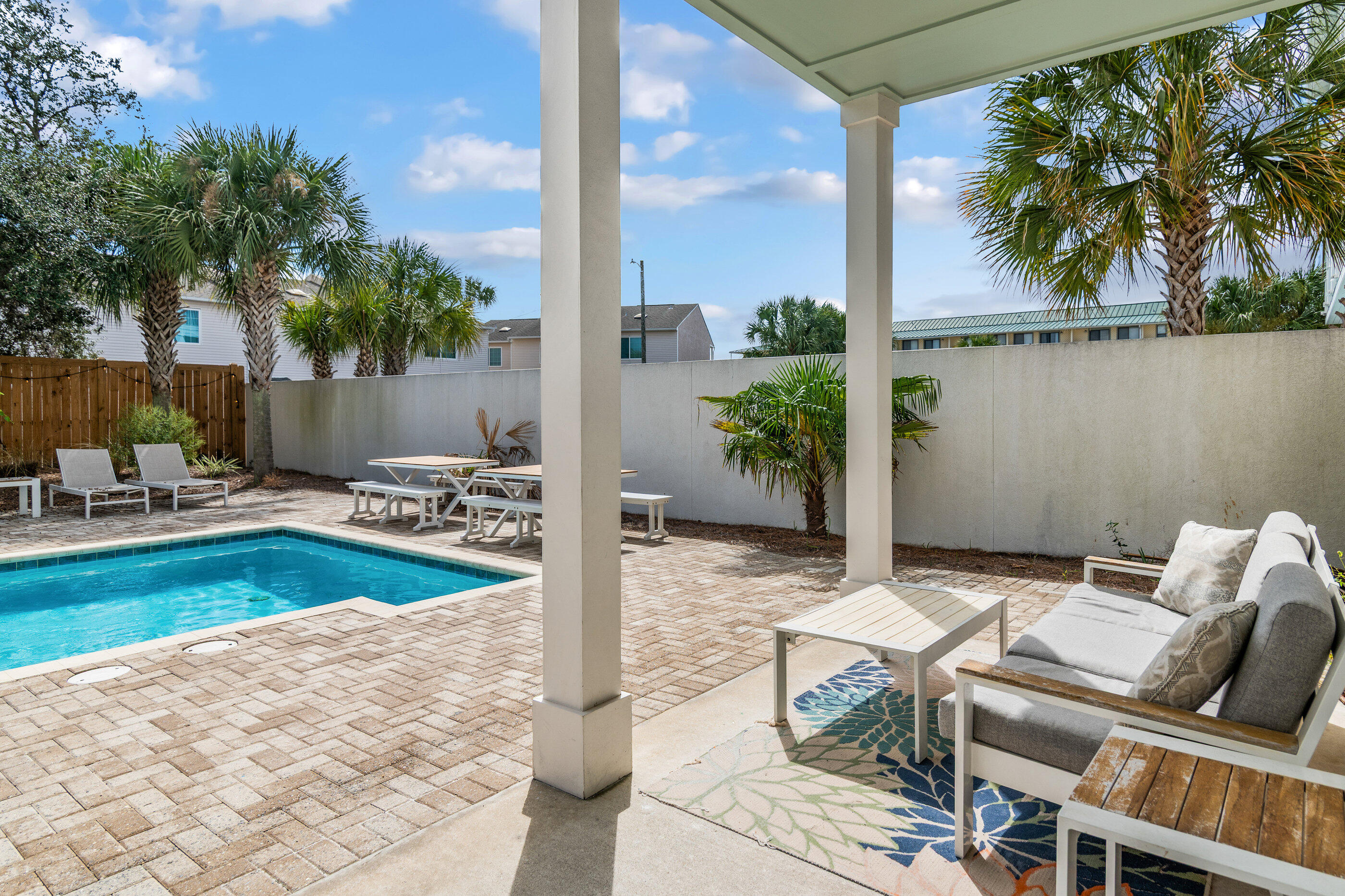 240 Driftwood Road Miramar Beach, FL 32550 - Photo 13 of 65 a backyard of a house with seating space