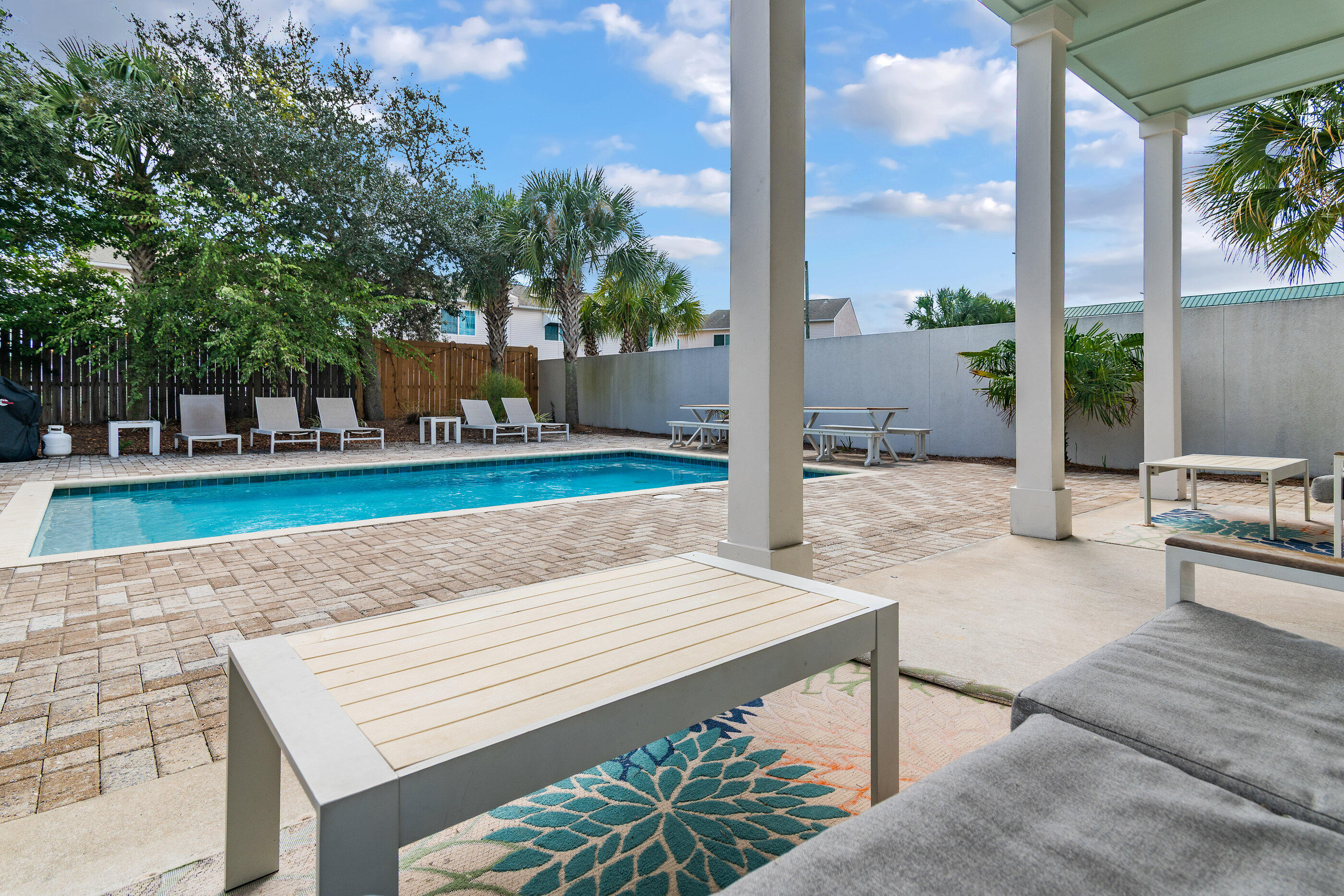 240 Driftwood Road Miramar Beach, FL 32550 - Photo 20 of 65 a view of a backyard with sitting area