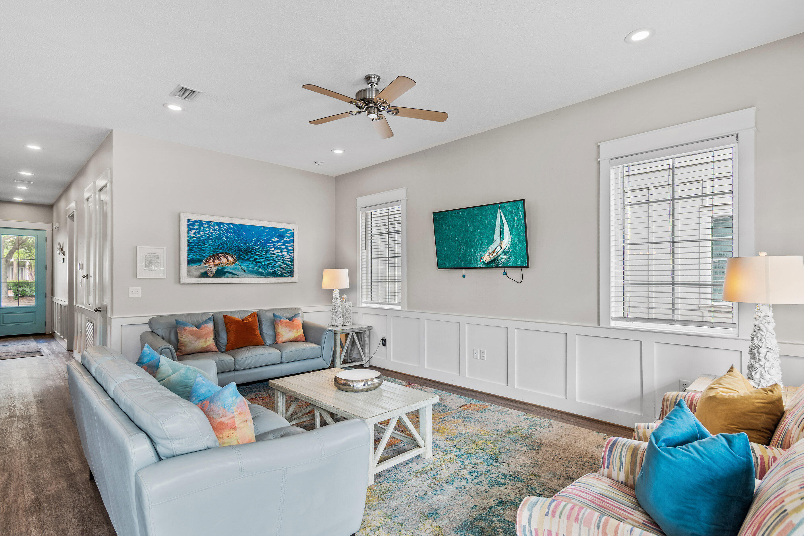 240 Driftwood Road Miramar Beach, FL 32550 - Photo 22 of 65 a living room with furniture and a flat screen tv