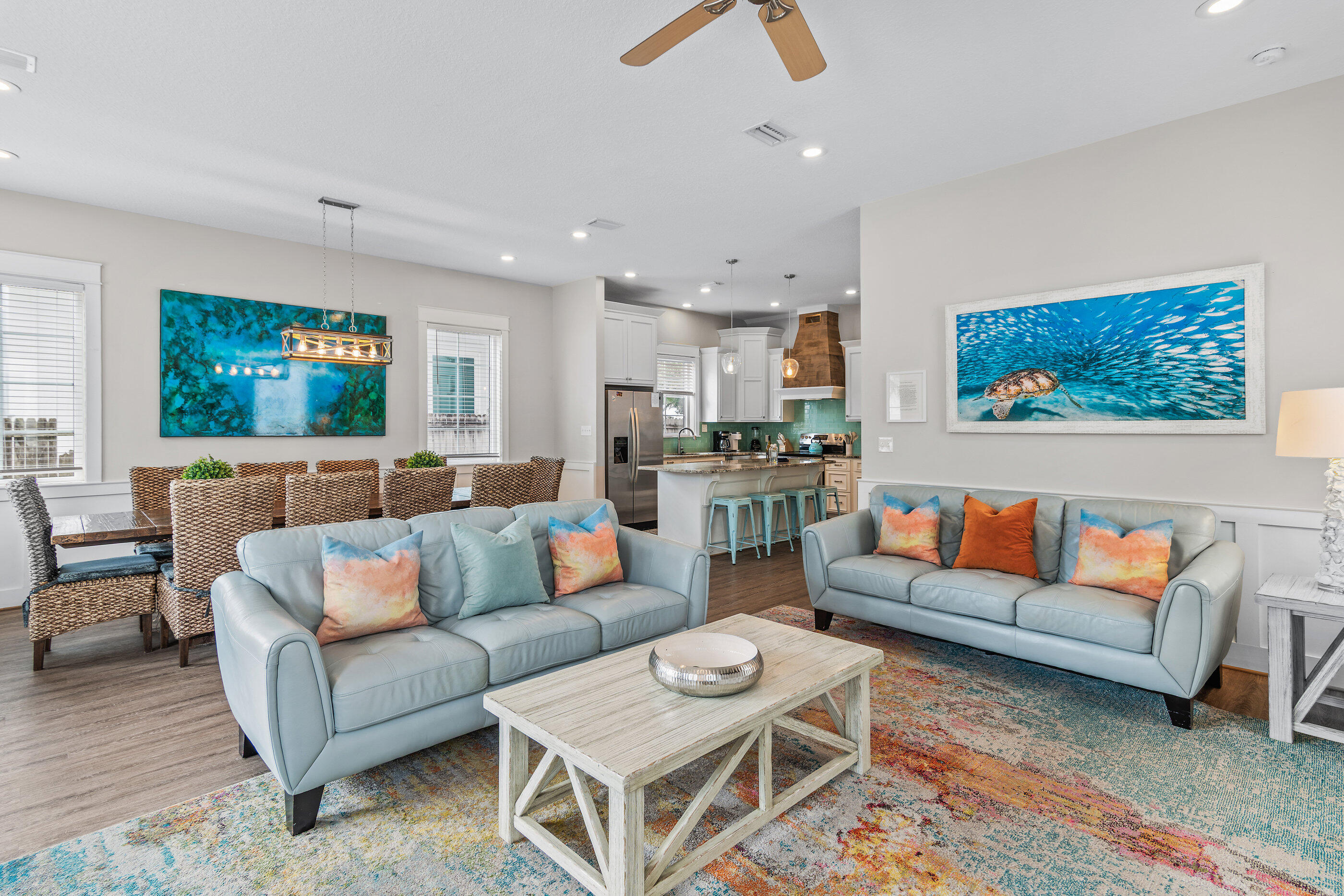240 Driftwood Road Miramar Beach, FL 32550 - Photo 23 of 65 a living room with furniture kitchen view and a table