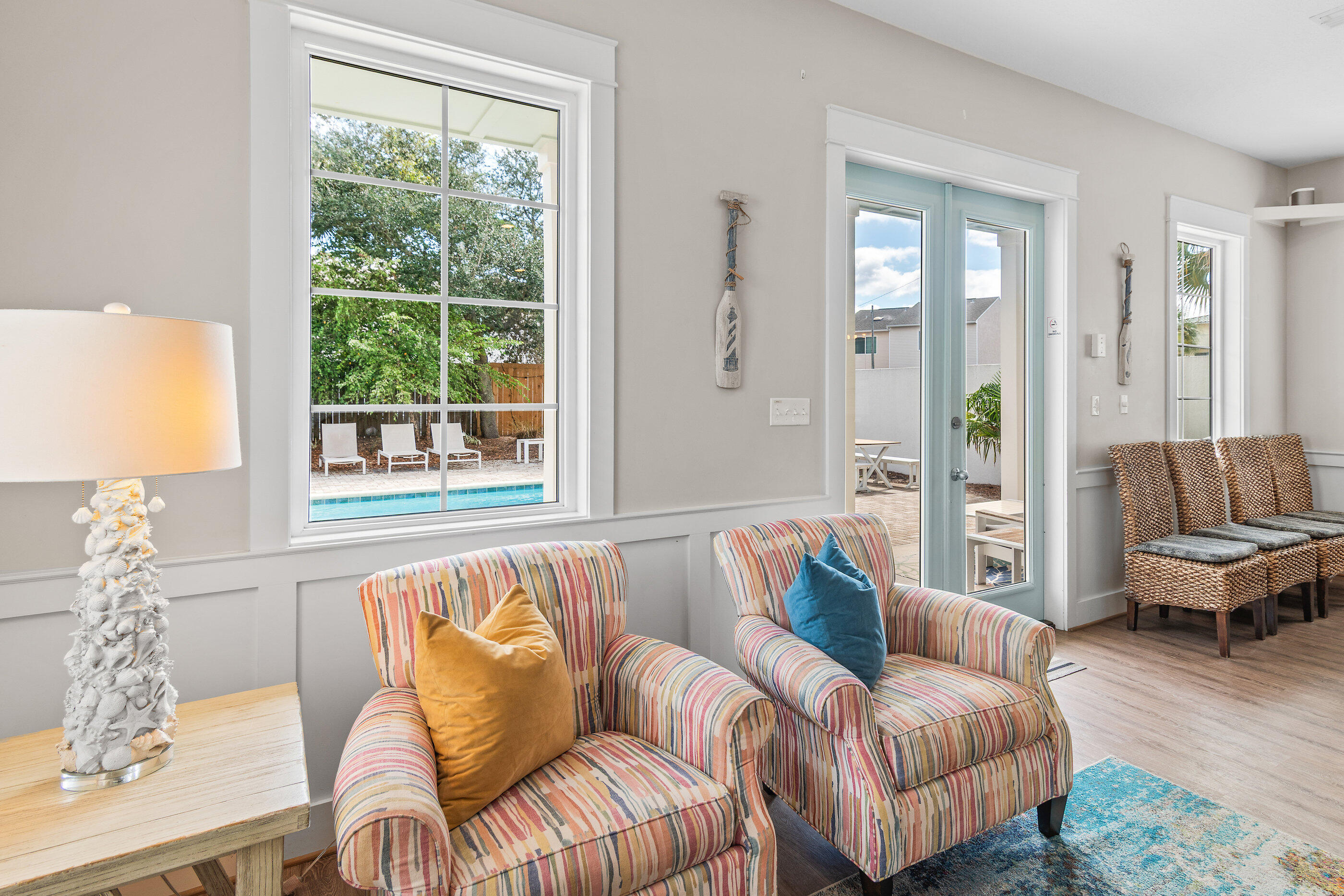 240 Driftwood Road Miramar Beach, FL 32550 - Photo 24 of 65 a living room with furniture and a large window