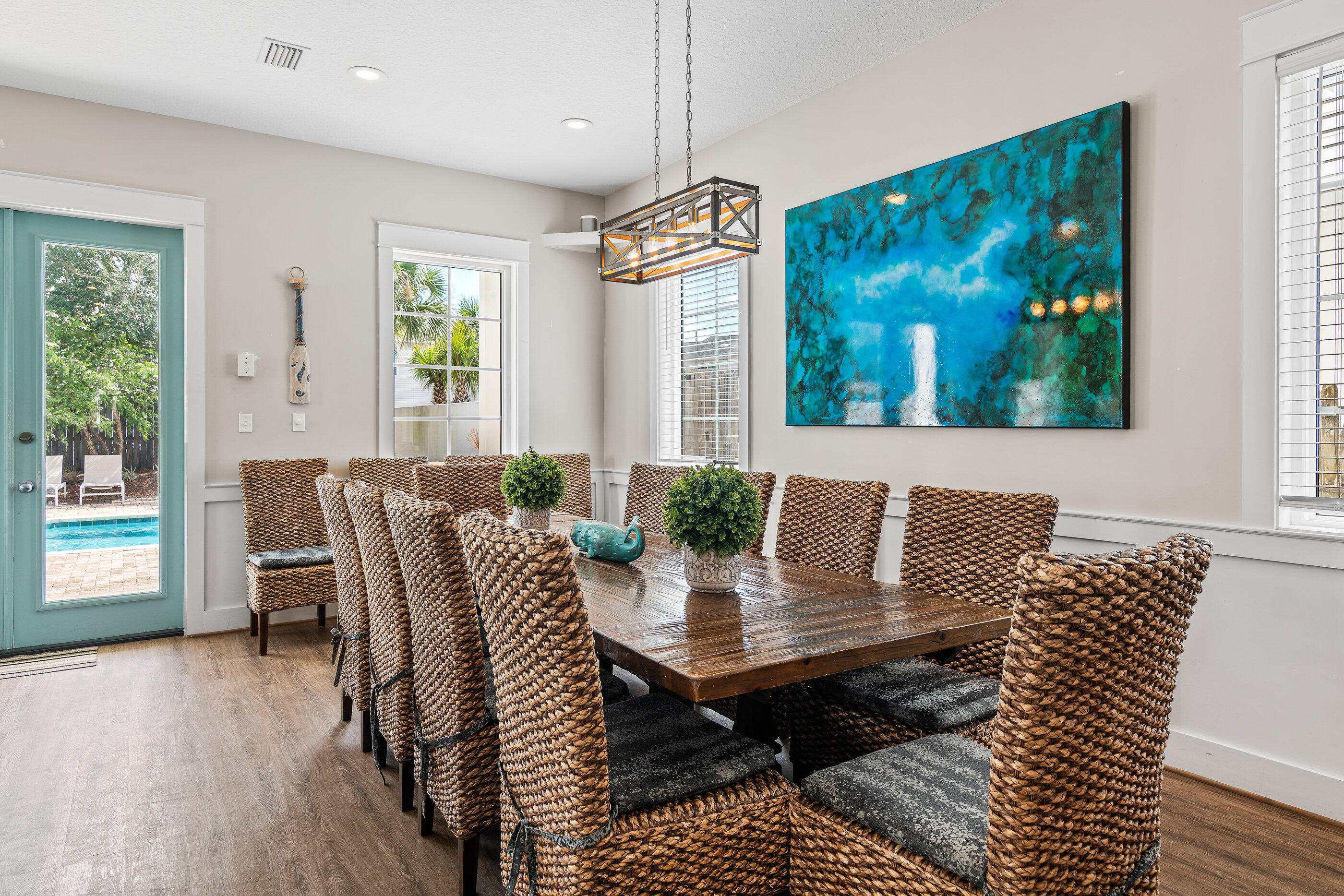 240 Driftwood Road Miramar Beach, FL 32550 - Photo 27 of 65 a view of a dining room with furniture window and wooden floor