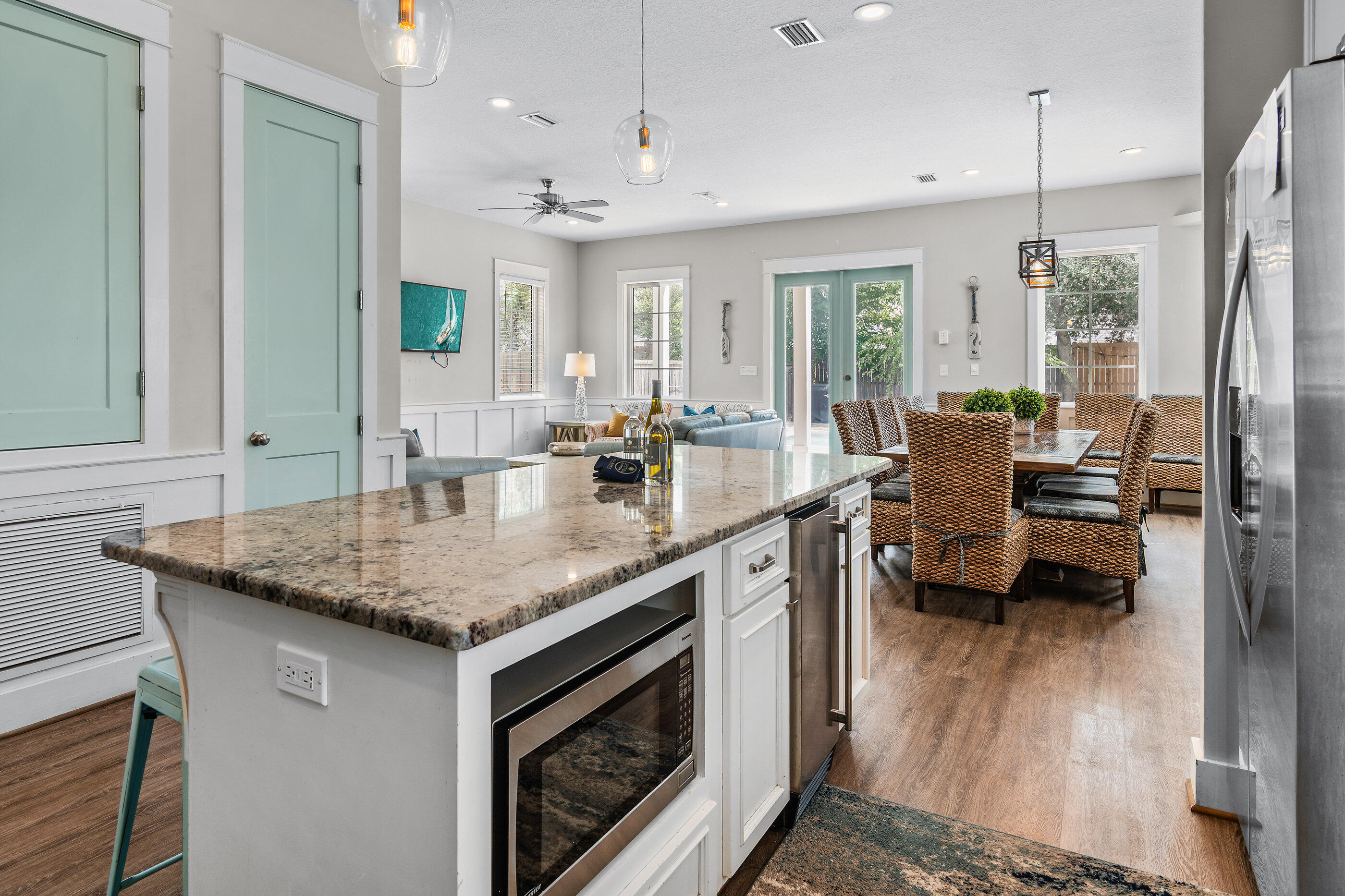 240 Driftwood Road Miramar Beach, FL 32550 - Photo 34 of 65 a kitchen with stainless steel appliances granite countertop a stove and a sink