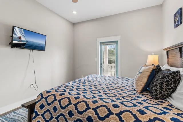 a room with furniture pool table and window