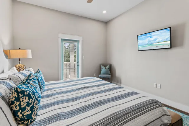 a bedroom with furniture and a book shelf