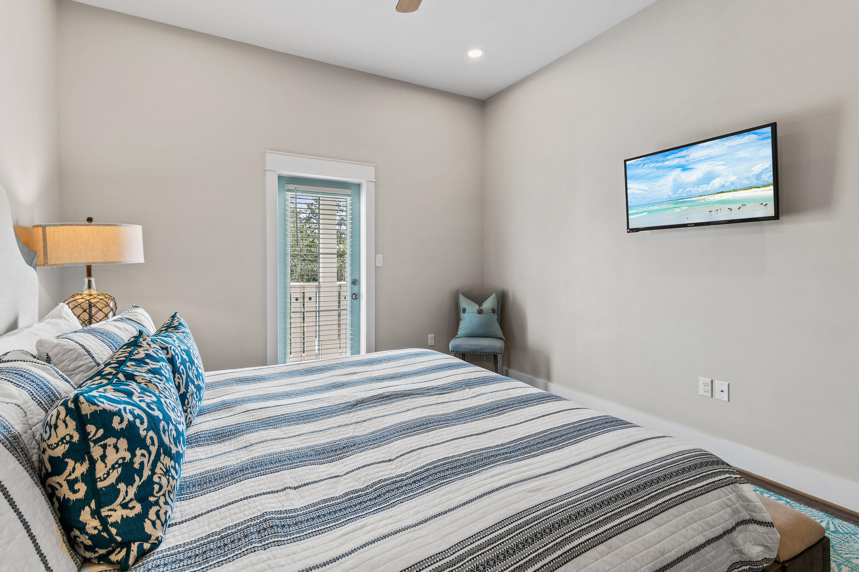 240 Driftwood Road Miramar Beach, FL 32550 - Photo 46 of 65 a bedroom with a bed and a window