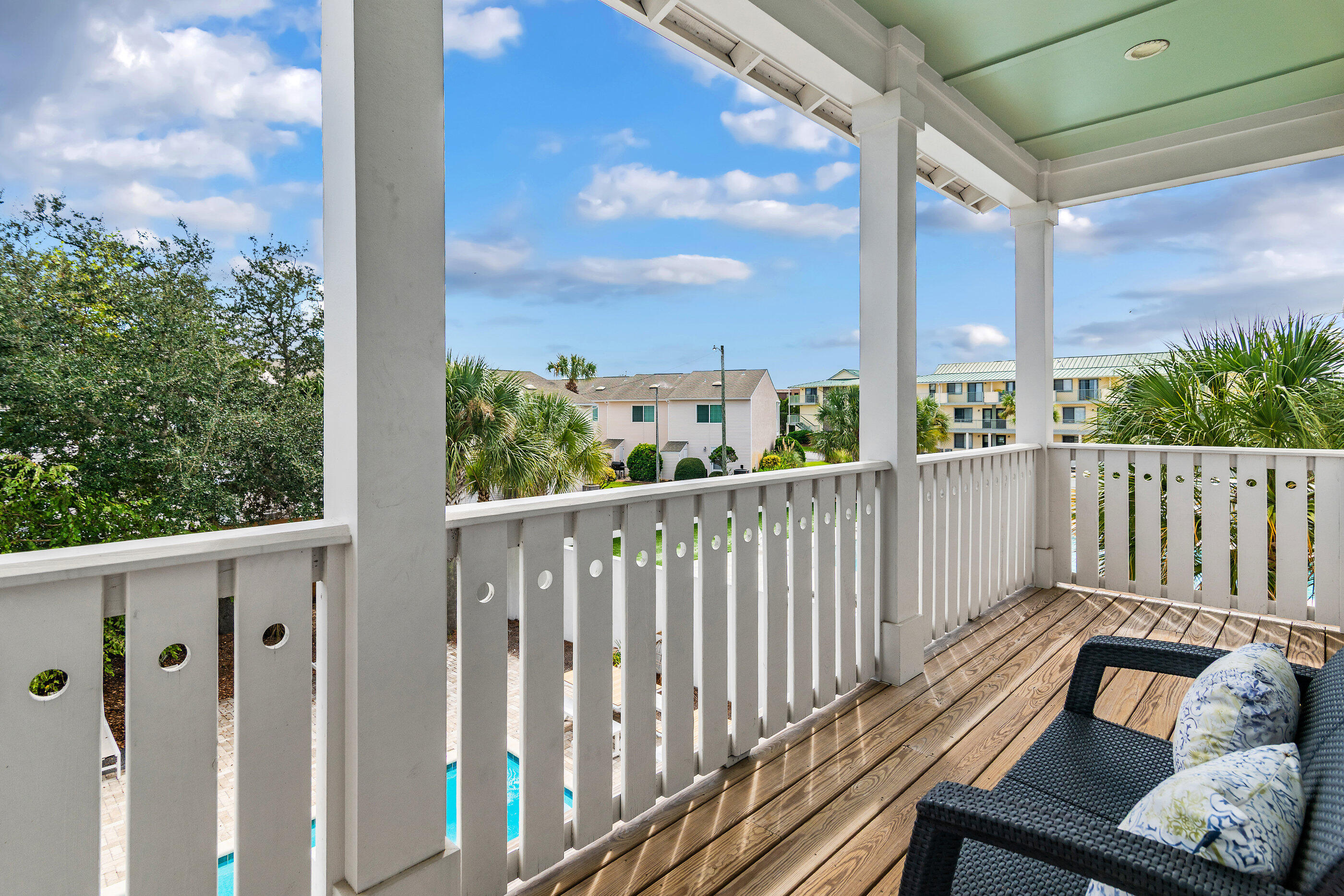 240 Driftwood Road Miramar Beach, FL 32550 - Photo 49 of 65 a view of a balcony with wooden floor