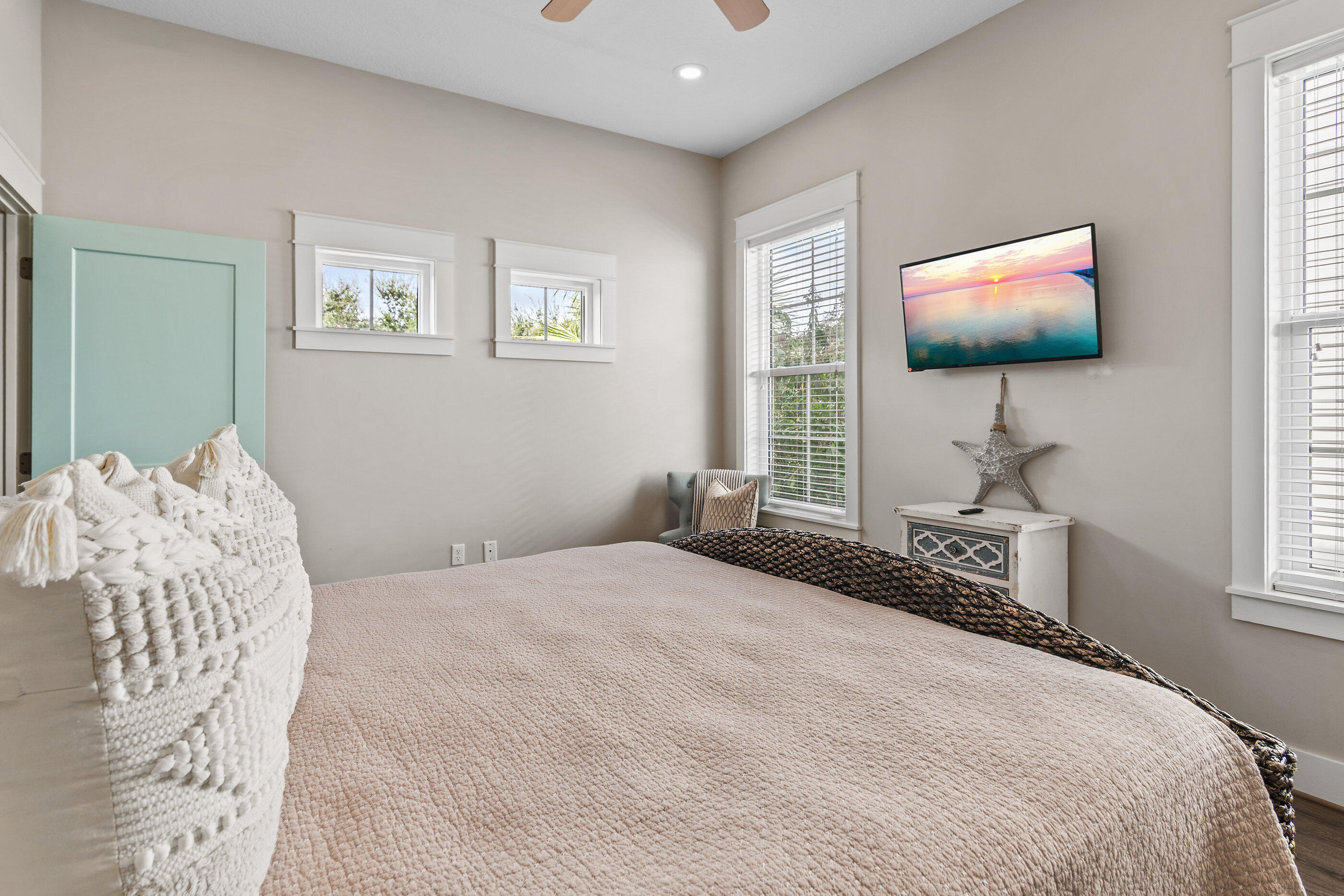 240 Driftwood Road Miramar Beach, FL 32550 - Photo 53 of 65 a bedroom with a bed and a flat screen tv