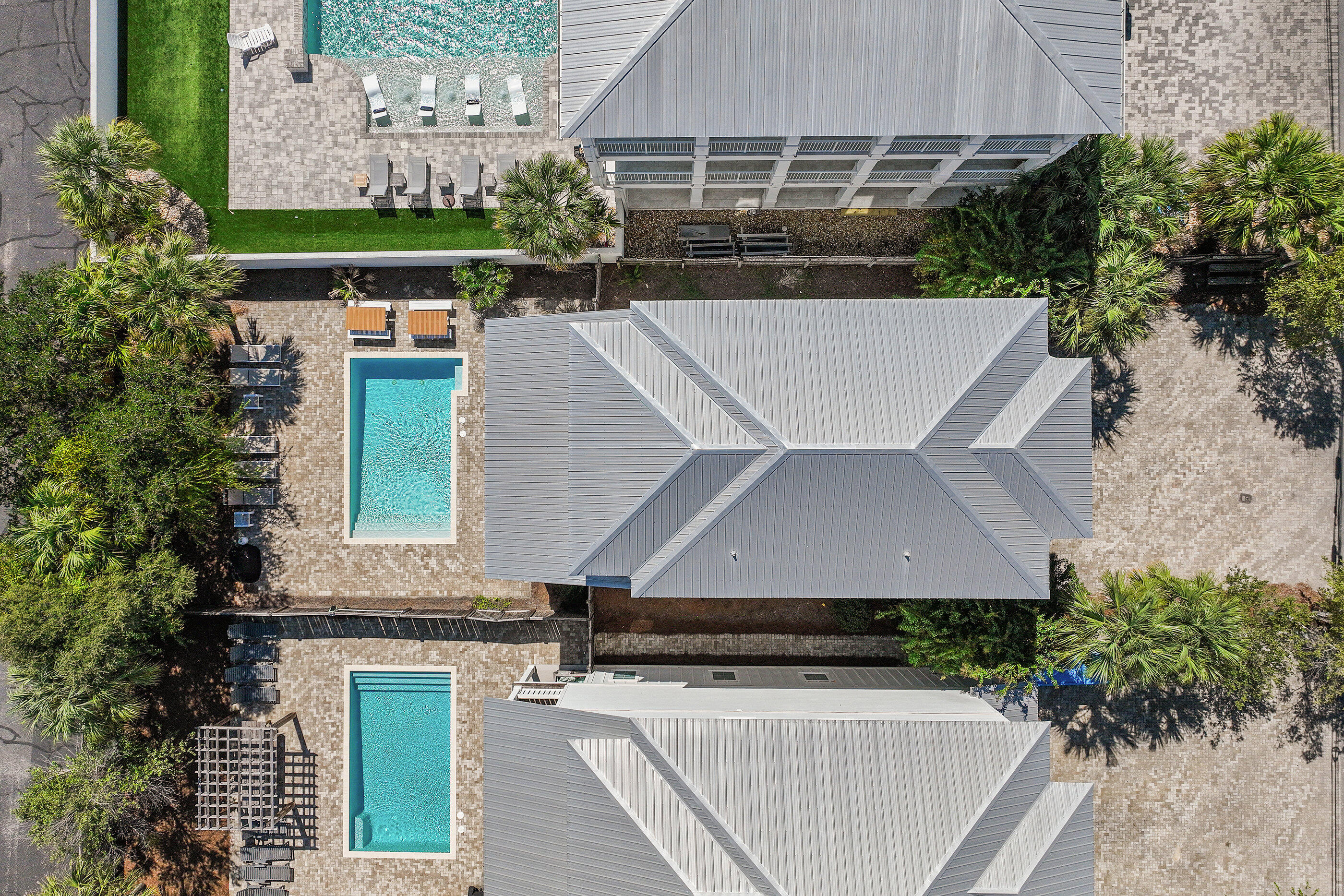240 Driftwood Road Miramar Beach, FL 32550 - Photo 7 of 65 an aerial view of a house with a yard and potted plants