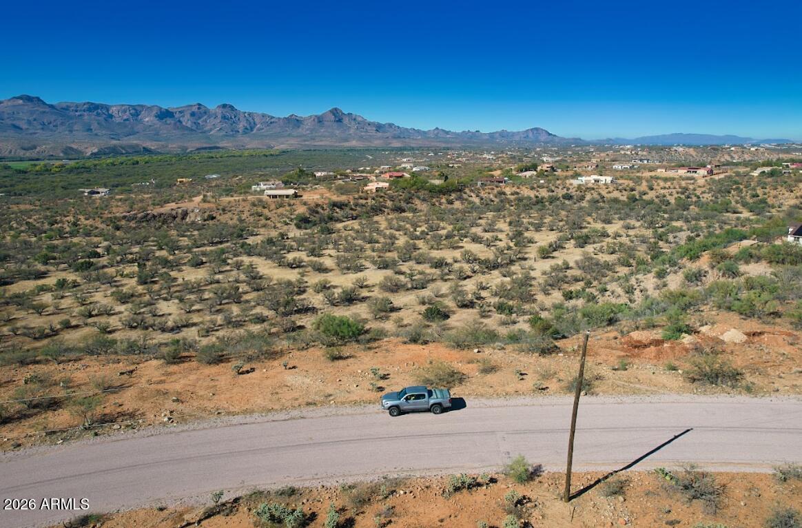 a view of a city with mountains in the background