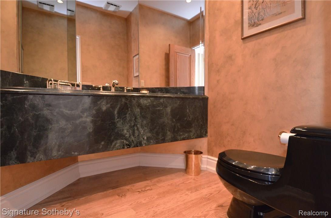 8400 Ridge Road Canton, MI 48187 - Photo 38 of 69 Elegant Powder Room with Custom Gold Finishes
