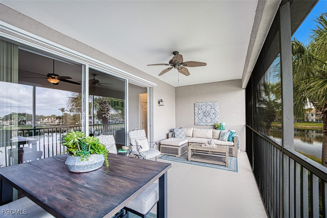 9570 Hemingway Lane, Unit 3205 Fort Myers, FL 33913 - Photo 17 of 43 a view of a dining room with furniture window and wooden floor