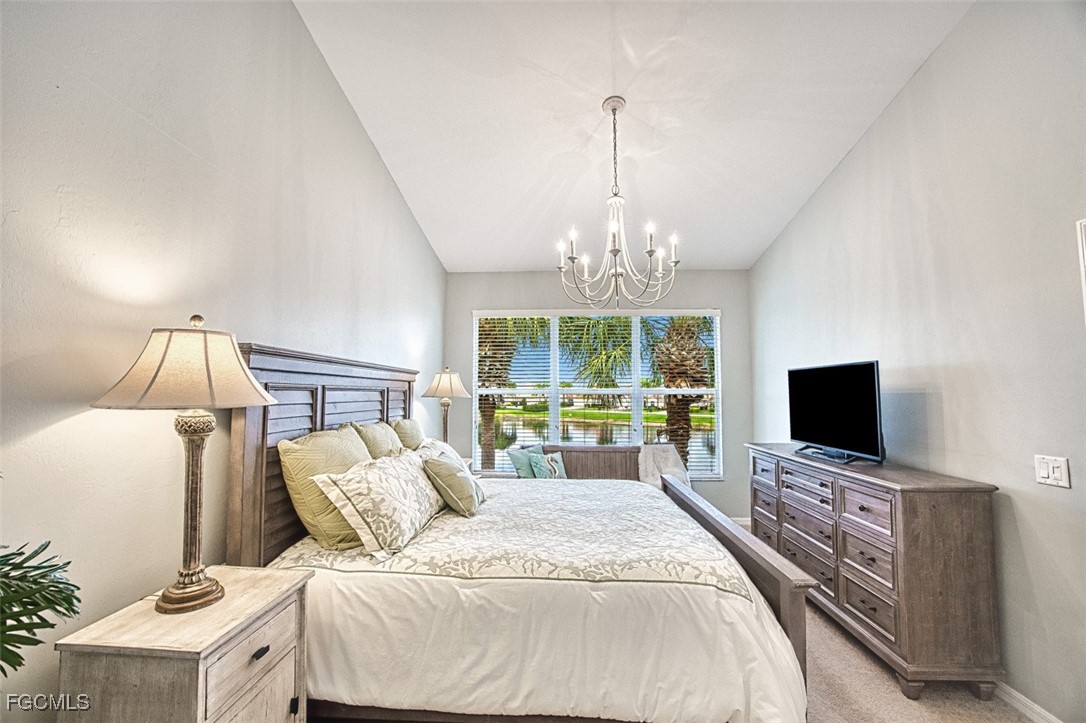 9570 Hemingway Lane, Unit 3205 Fort Myers, FL 33913 - Photo 22 of 43 a living room with furniture and a flat screen tv