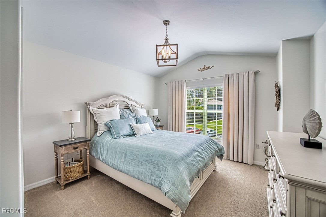 9570 Hemingway Lane, Unit 3205 Fort Myers, FL 33913 - Photo 27 of 43 a bedroom with a bed and a window