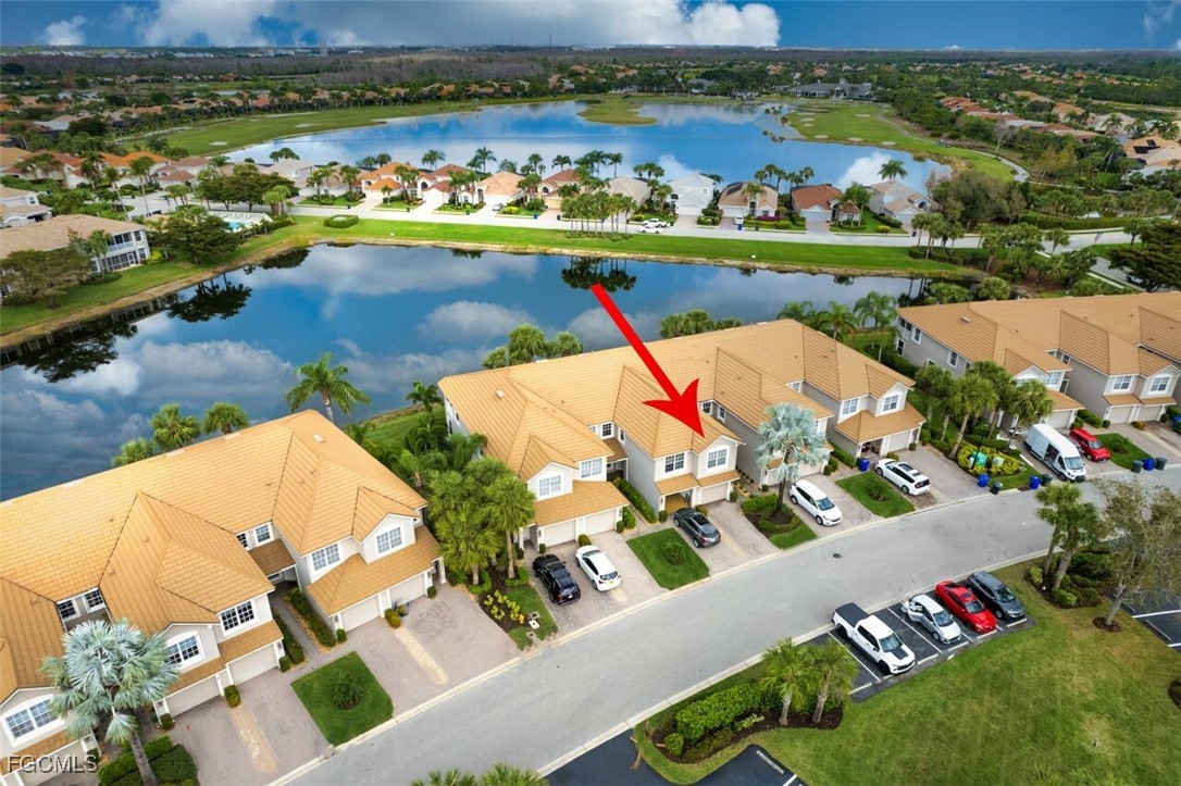 9570 Hemingway Lane, Unit 3205 Fort Myers, FL 33913 - Photo 3 of 43 an aerial view of a house with a lake view