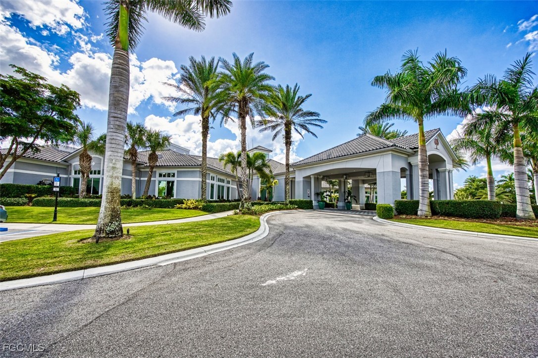 9570 Hemingway Lane, Unit 3205 Fort Myers, FL 33913 - Photo 31 of 43 a front view of house with yard and green space