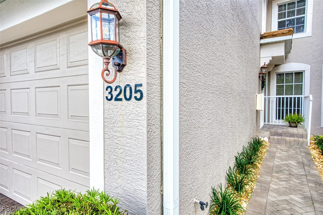 9570 Hemingway Lane, Unit 3205 Fort Myers, FL 33913 - Photo 6 of 43 a sign that is on the side of a building