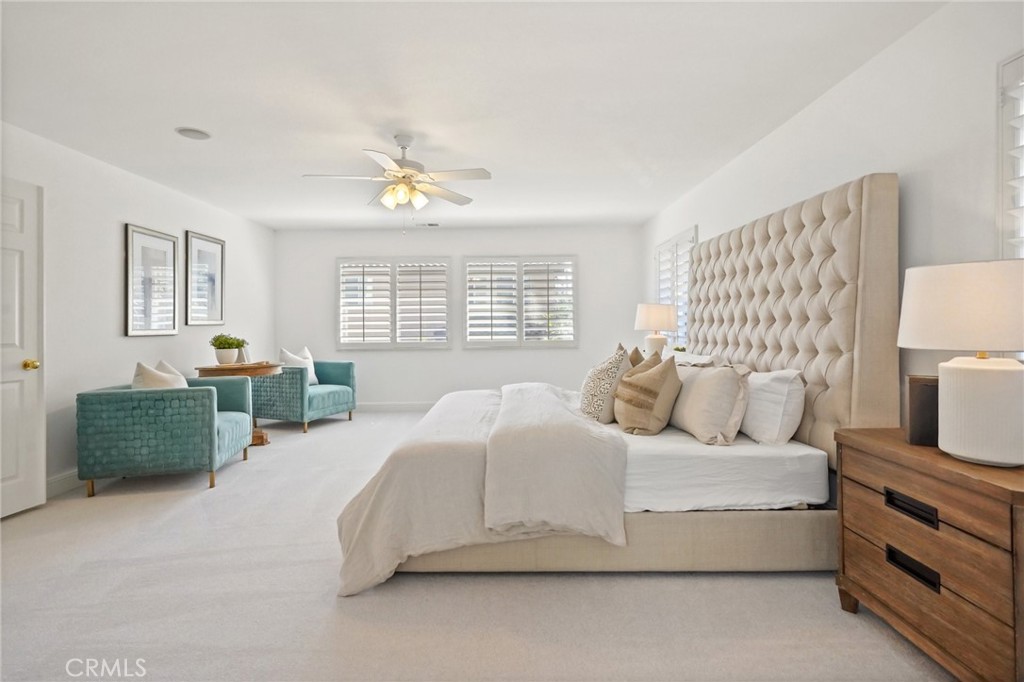 28 Rosenblum Irvine, CA 92602 - Photo 16 of 30 a bedroom with a bed and a couch