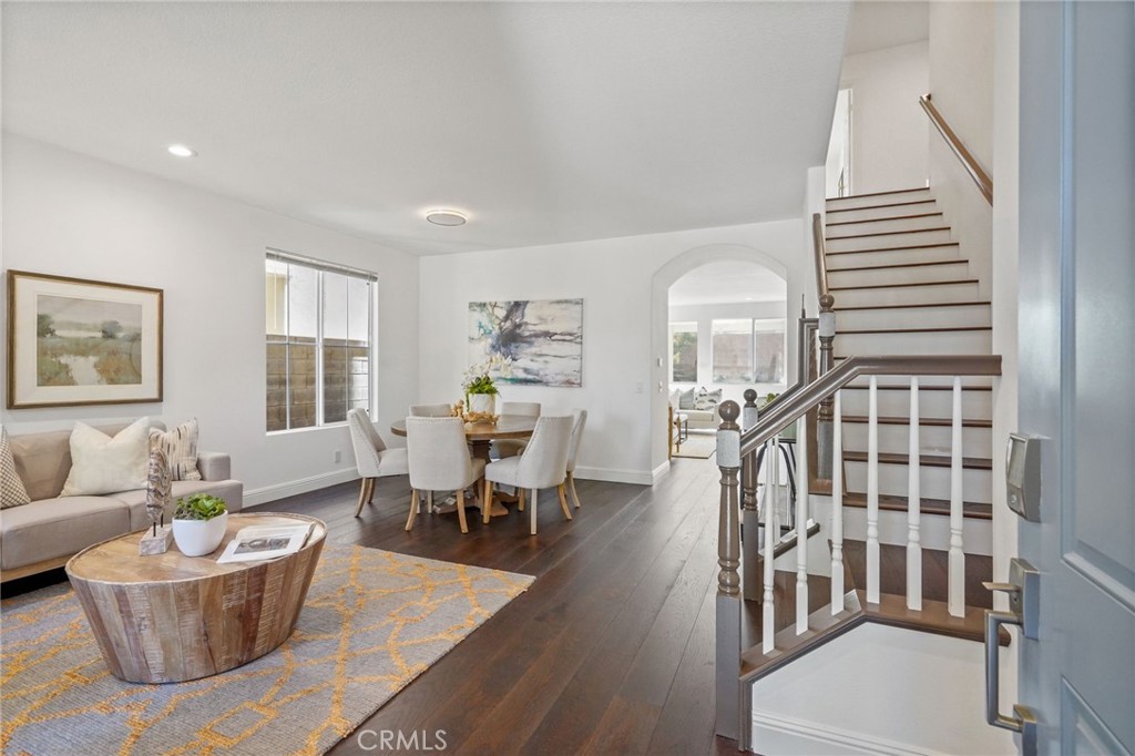 28 Rosenblum Irvine, CA 92602 - Photo 5 of 30 a living room with furniture and wooden floor