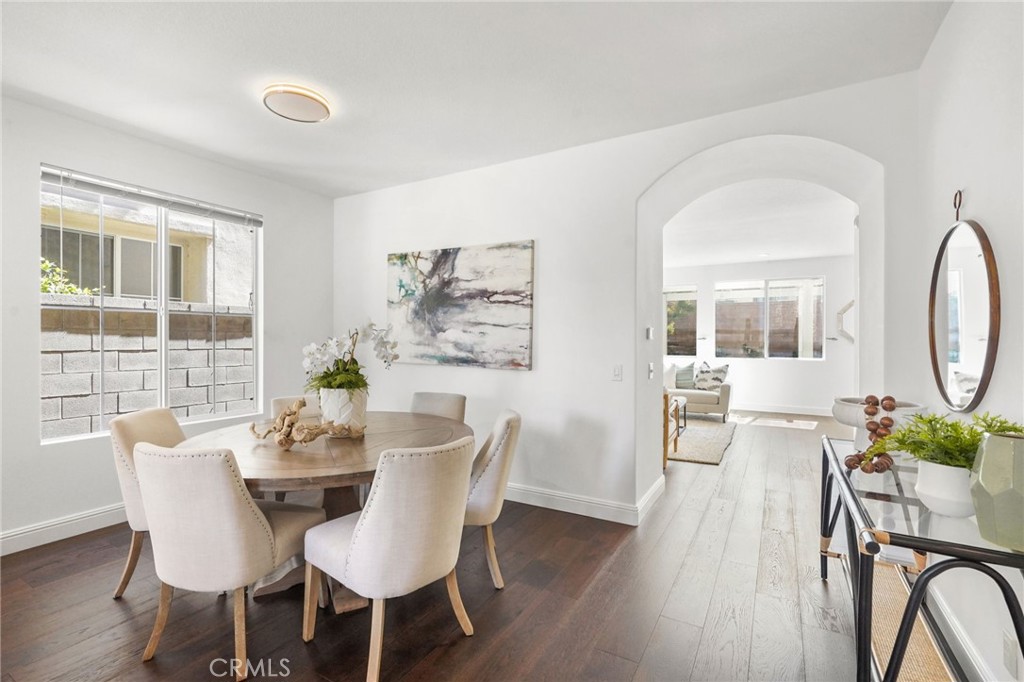 28 Rosenblum Irvine, CA 92602 - Photo 6 of 30 a view of a dining room with furniture window and wooden floor