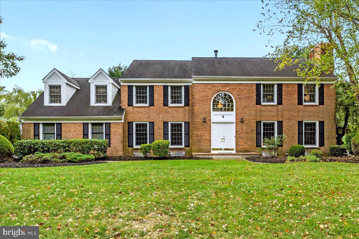 4 Banff Drive Princeton Junction, NJ 08550 - Photo 1 of 46 a front view of a house with garden
