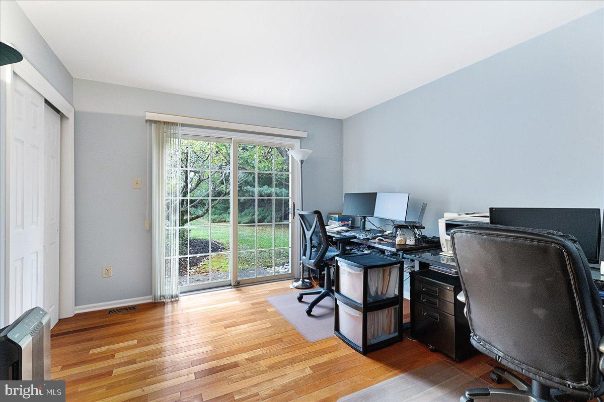 4 Banff Drive Princeton Junction, NJ 08550 - Photo 18 of 46 a workspace with wooden floor and a window